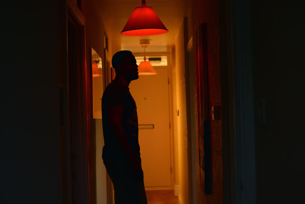 shadowy figure in hallway